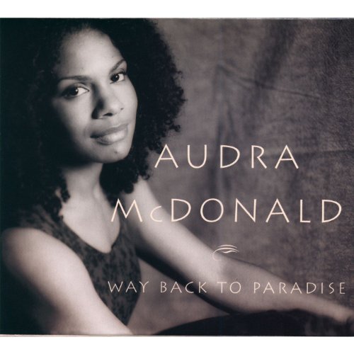 The cover of Audra McDonald's album "Way Back to Paradise" featuring Audra seated and smiling calmly in front of a neutral background.